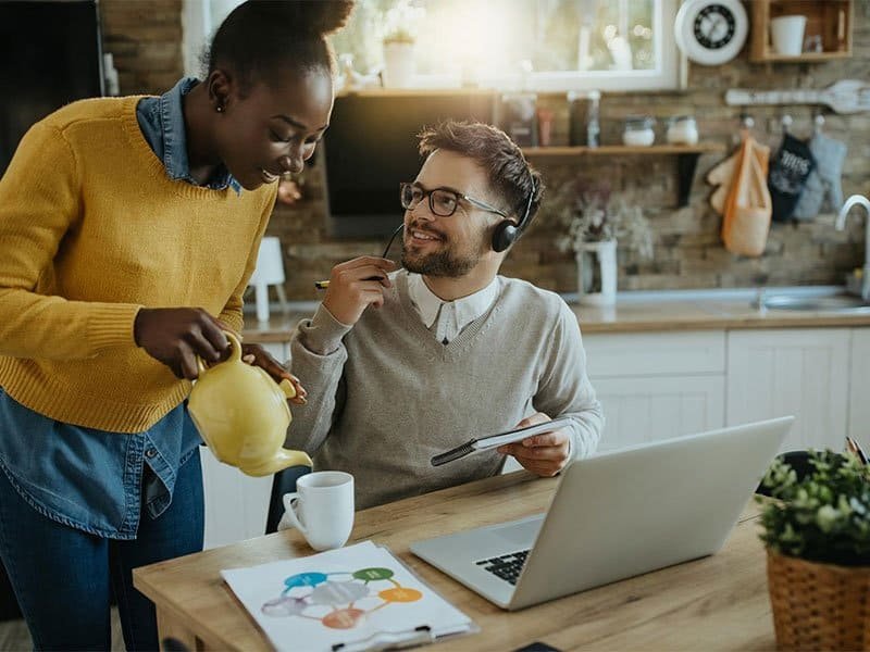 Family reviewing finances together – compare insurance quotes online